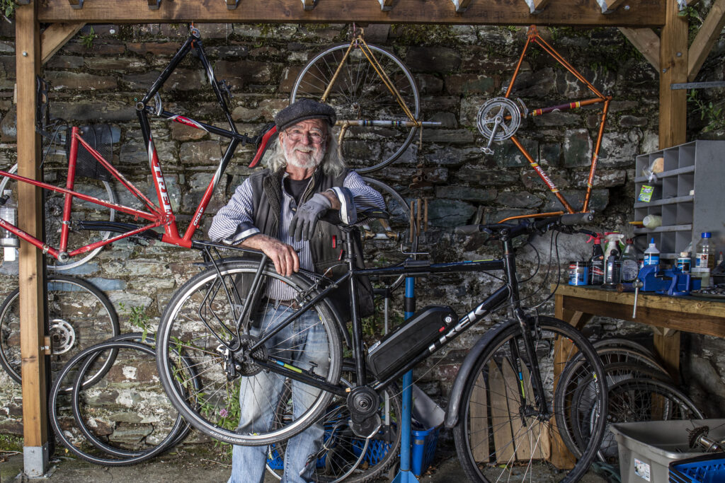 Jack Kelleher of Clonakilty, West Cork in a workshop with his electric bicycle.